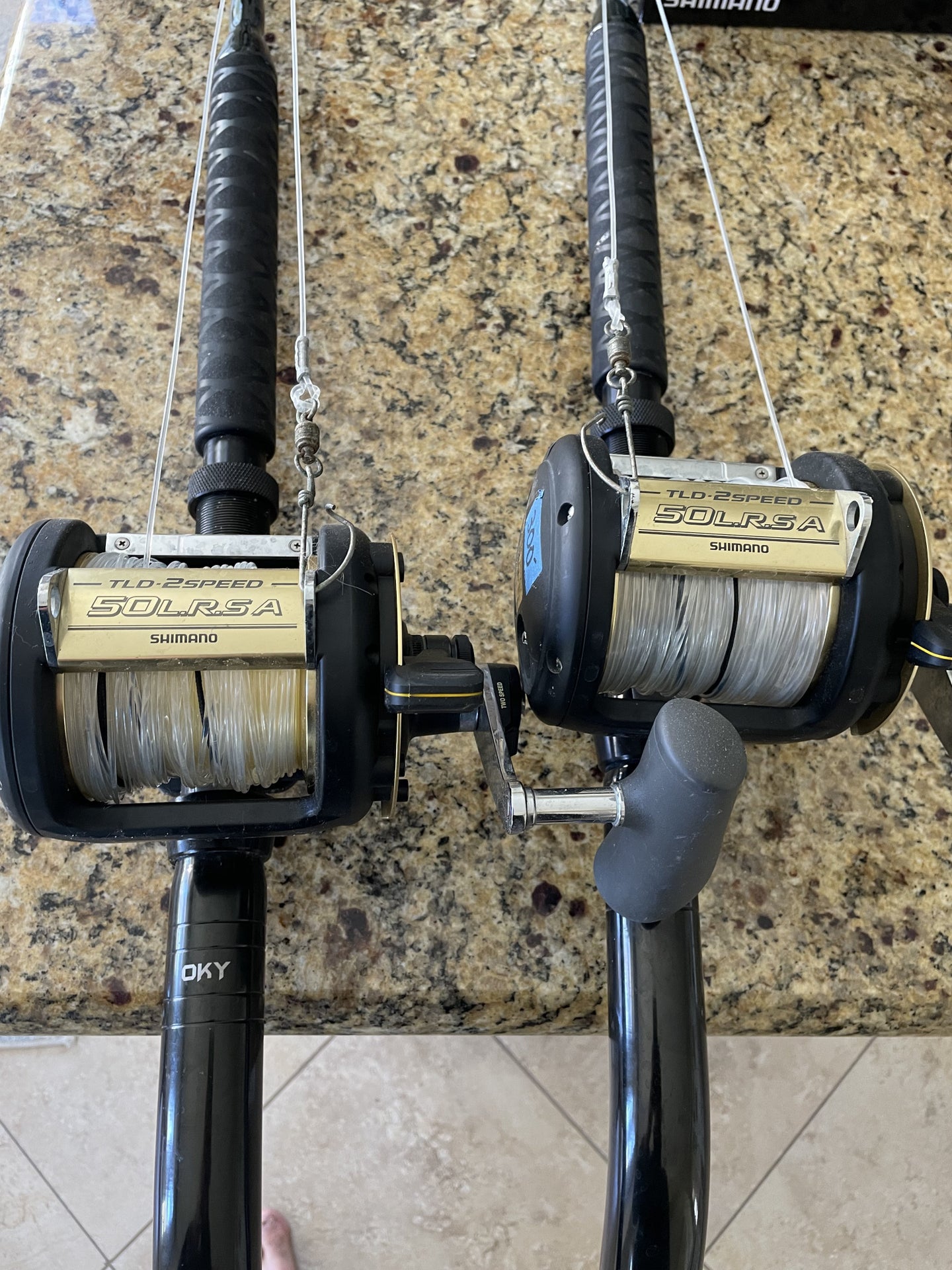 Two Shimano TLD 50LRSA 2speed reels matched w/ Okyaia bent but rods.